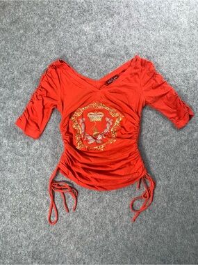 Vintage orange baby Phat Ruched V-Neck Top with Crest Graphic